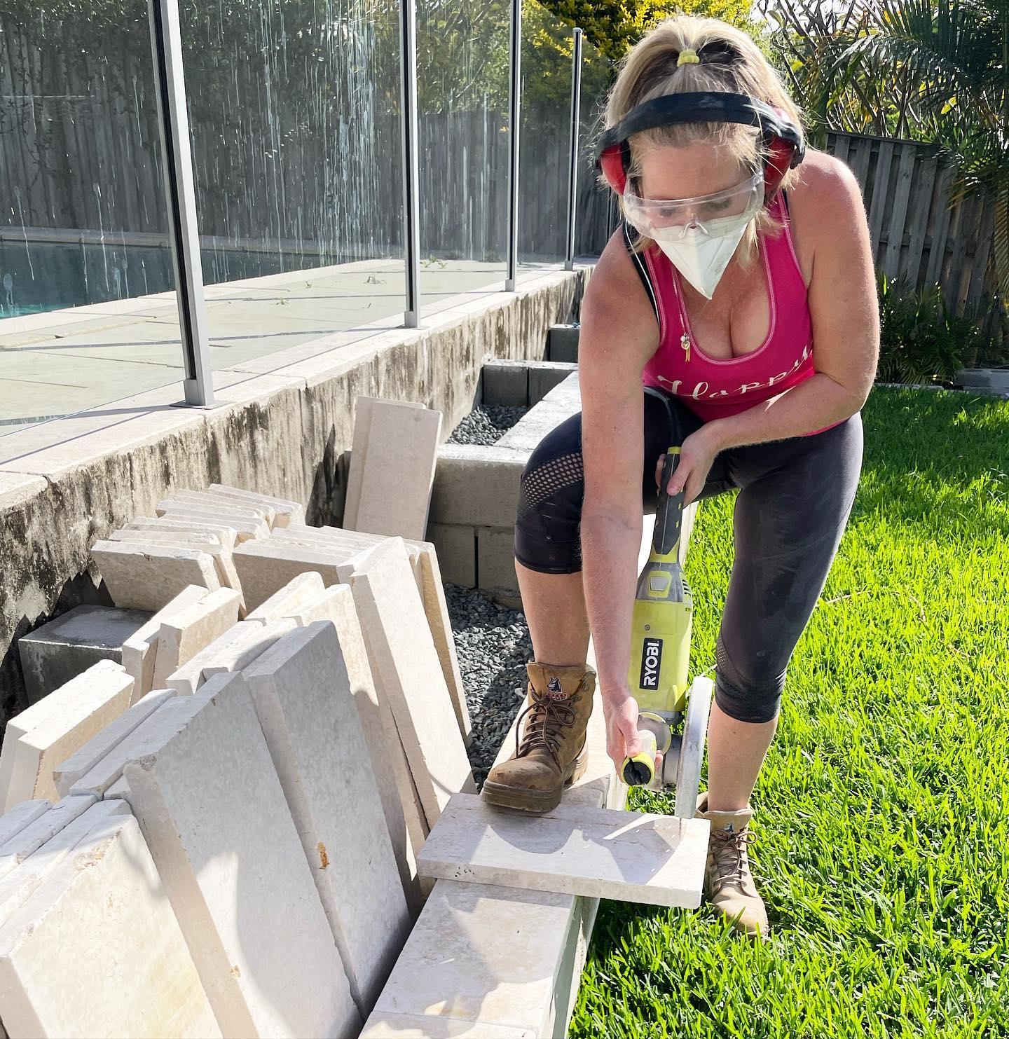 It’s still a work in progress but ryobiau angle grinder was the hero of the day this long weekend as we work on our backyard project! Cutting stone tiles for the edging around our raised garden beds 🪴 #ryobimade