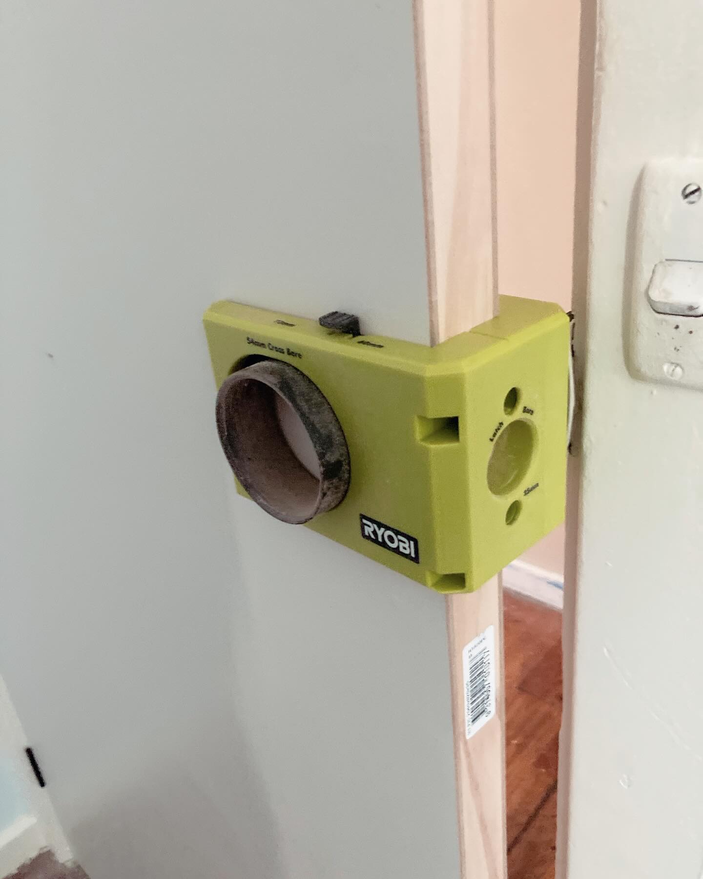 installation of door handles made easy with the ryobiau door jig from Bunnings and my boschtoolsanz  dills. It comes with everything needed to lineup and drill the holes needed for internal doors. #diy #powerhaus #ryobi #boschprofessional
