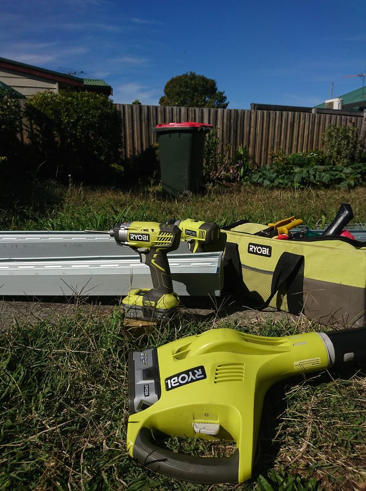 Hand crafted gutter - drill hole with Ryobi and clean up with Ryobi :P